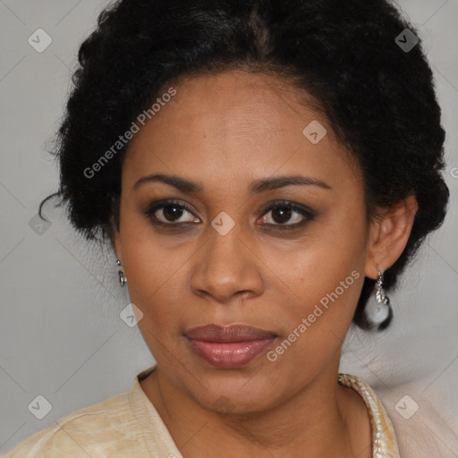 Joyful latino adult female with medium  brown hair and brown eyes