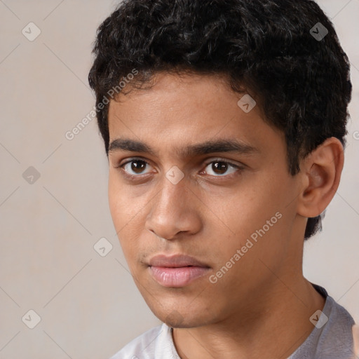 Neutral white young-adult male with short  black hair and brown eyes