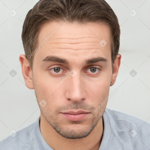 Neutral white young-adult male with short  brown hair and grey eyes