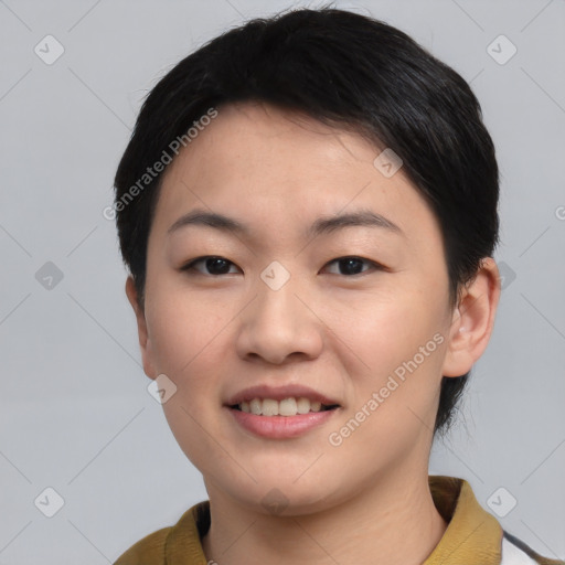 Joyful asian young-adult female with short  black hair and brown eyes