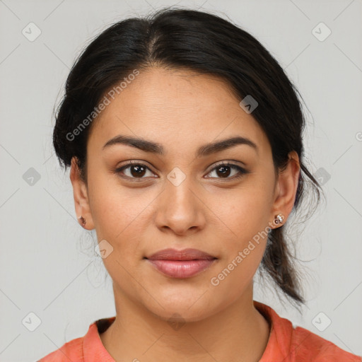 Joyful latino young-adult female with medium  brown hair and brown eyes