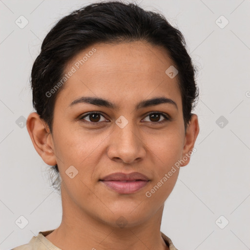 Joyful latino young-adult female with short  brown hair and brown eyes