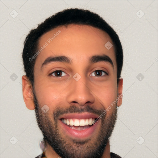 Joyful white young-adult male with short  black hair and brown eyes