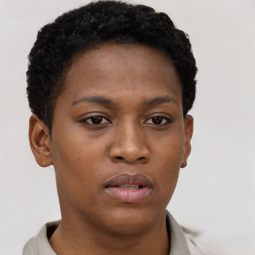 Neutral black young-adult female with short  brown hair and brown eyes