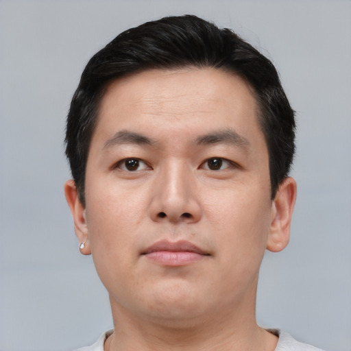 Neutral asian young-adult male with short  black hair and brown eyes