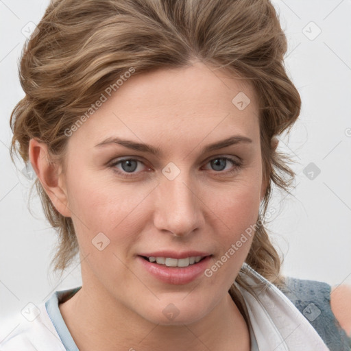 Joyful white young-adult female with medium  brown hair and blue eyes