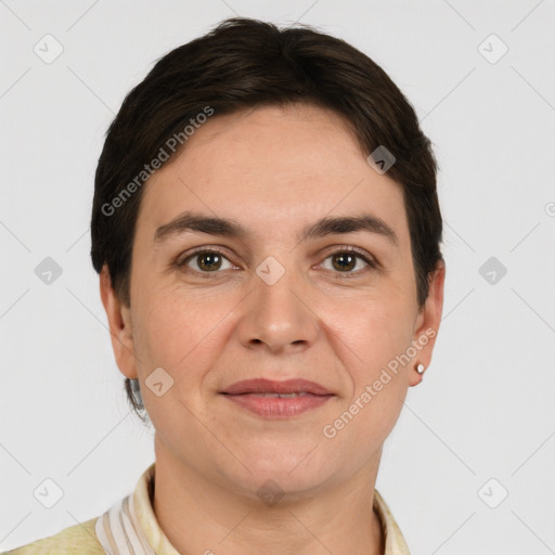 Joyful white young-adult female with short  brown hair and grey eyes