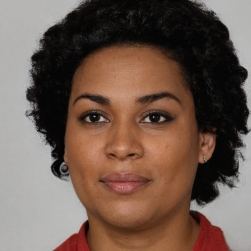 Neutral latino young-adult female with short  black hair and brown eyes