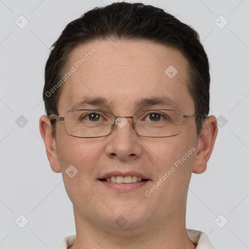 Joyful white adult male with short  brown hair and grey eyes