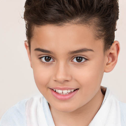 Joyful white child female with short  brown hair and brown eyes