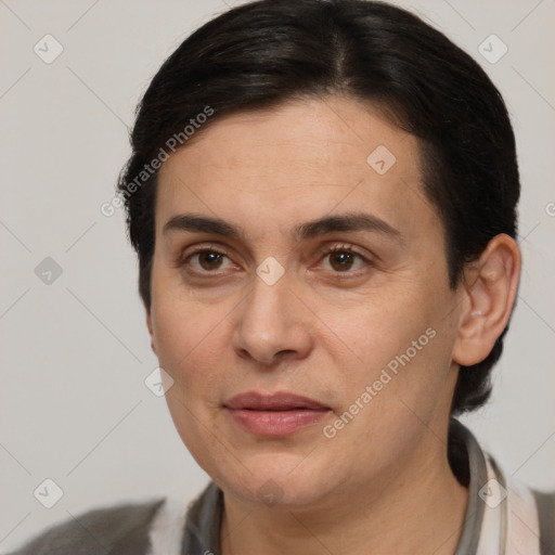 Joyful white adult female with medium  brown hair and brown eyes