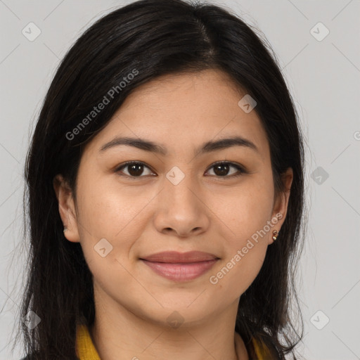 Joyful latino young-adult female with long  brown hair and brown eyes