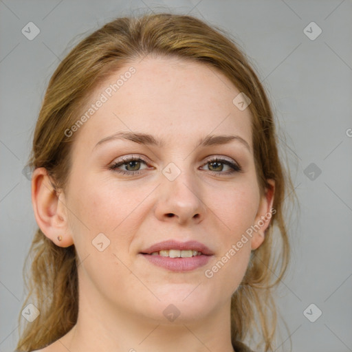 Joyful white young-adult female with medium  brown hair and blue eyes