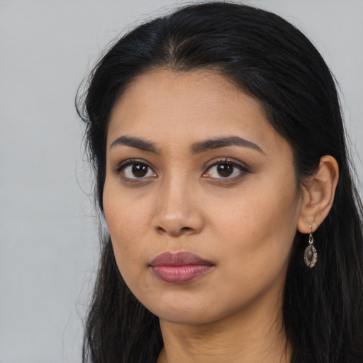 Neutral asian young-adult female with long  black hair and brown eyes