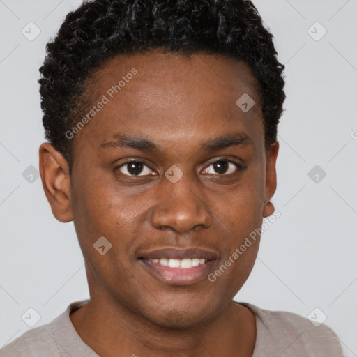 Joyful black young-adult male with short  brown hair and brown eyes