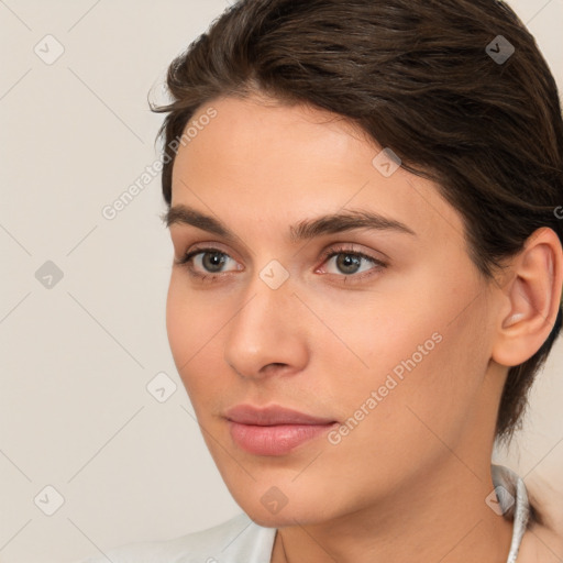 Neutral white young-adult female with medium  brown hair and brown eyes