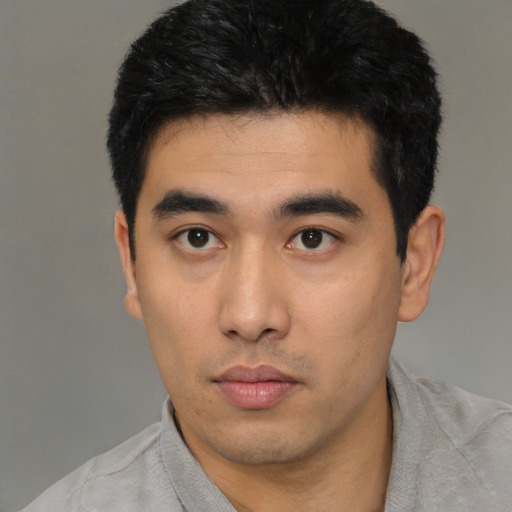 Neutral asian young-adult male with short  black hair and brown eyes