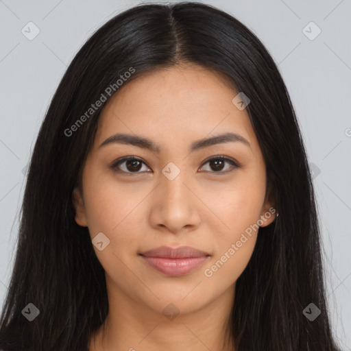 Joyful latino young-adult female with long  black hair and brown eyes