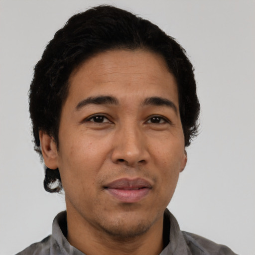 Neutral latino adult male with short  black hair and brown eyes