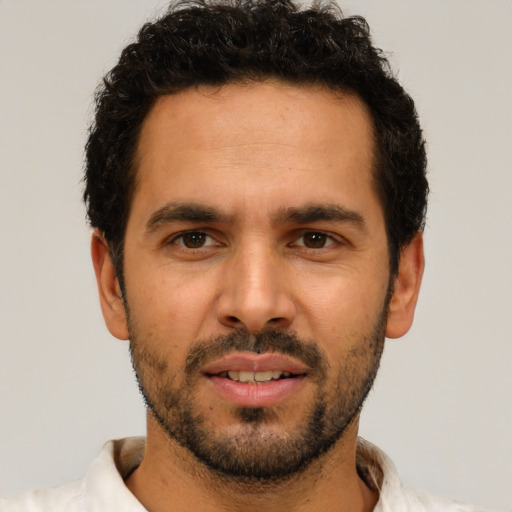 Neutral white young-adult male with short  black hair and brown eyes
