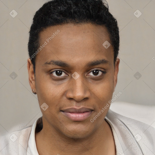 Joyful black young-adult male with short  black hair and brown eyes