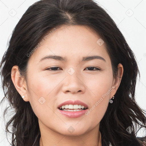 Joyful asian young-adult female with long  brown hair and brown eyes