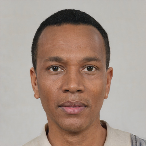 Neutral black young-adult male with short  black hair and brown eyes