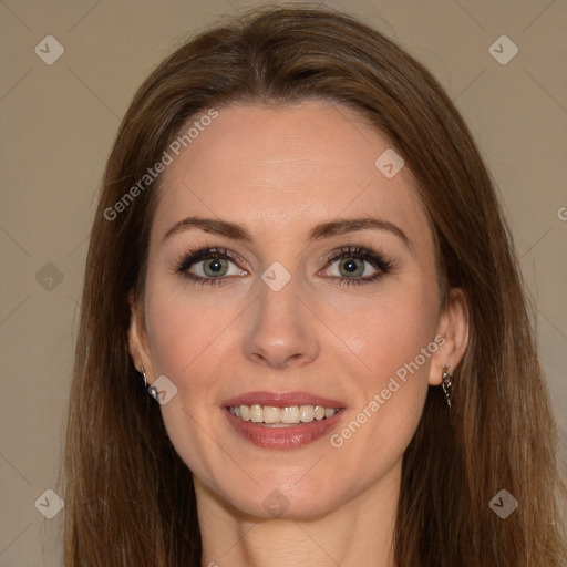 Joyful white young-adult female with long  brown hair and green eyes