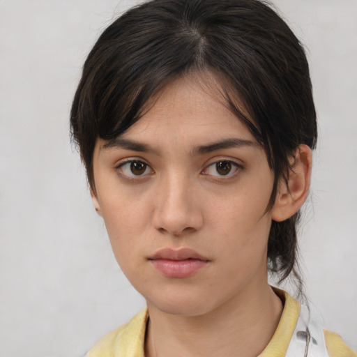 Neutral white young-adult female with medium  brown hair and brown eyes