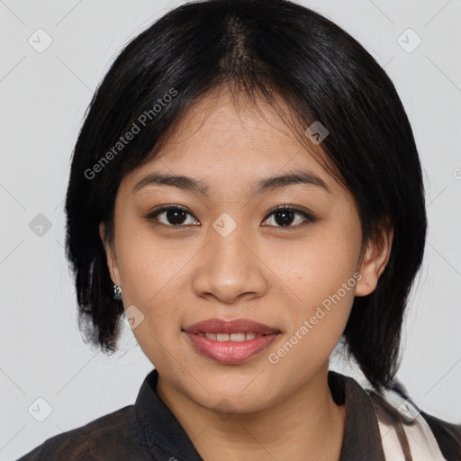 Joyful asian young-adult female with medium  black hair and brown eyes