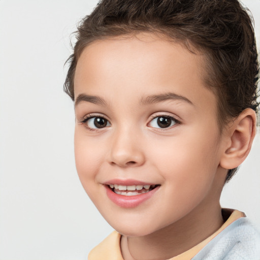 Joyful white child female with short  brown hair and brown eyes