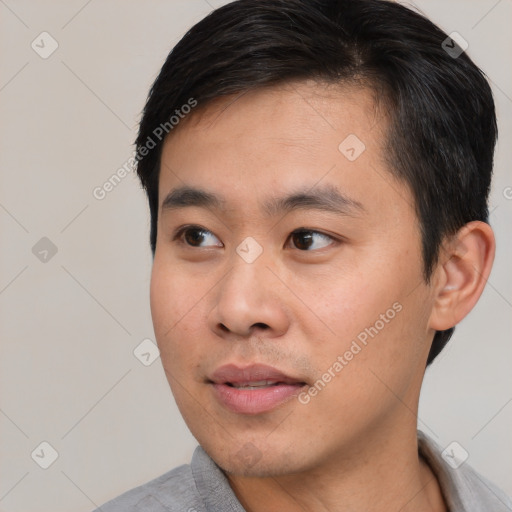 Neutral asian young-adult male with short  black hair and brown eyes