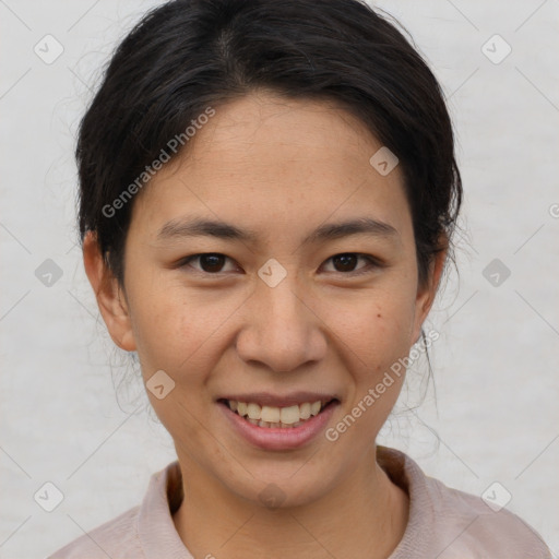 Joyful asian young-adult female with short  brown hair and brown eyes