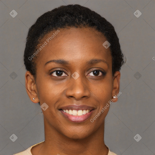 Joyful black young-adult female with short  brown hair and brown eyes