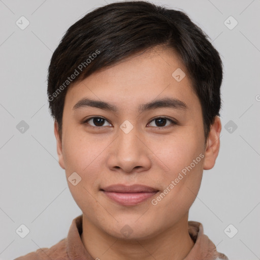 Joyful asian young-adult male with short  brown hair and brown eyes