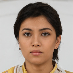 Neutral asian young-adult female with medium  brown hair and brown eyes