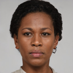 Neutral black young-adult female with short  brown hair and brown eyes