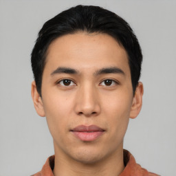 Neutral asian young-adult male with short  black hair and brown eyes