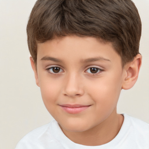 Joyful white child male with short  brown hair and brown eyes