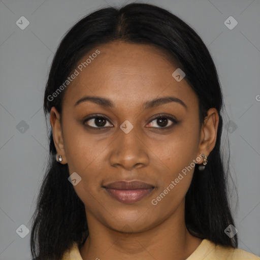 Joyful black young-adult female with long  black hair and brown eyes