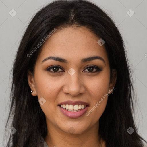 Joyful latino young-adult female with long  brown hair and brown eyes