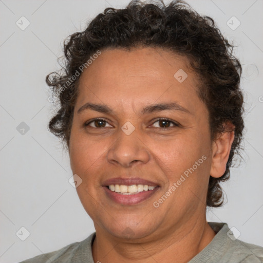 Joyful white adult female with short  brown hair and brown eyes