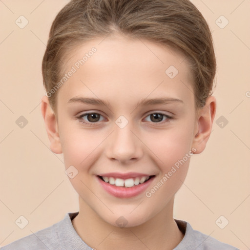 Joyful white child female with short  brown hair and brown eyes