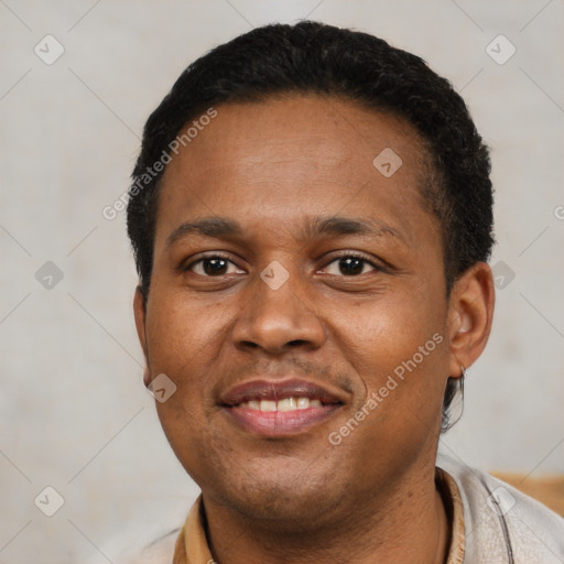 Joyful latino young-adult male with short  black hair and brown eyes