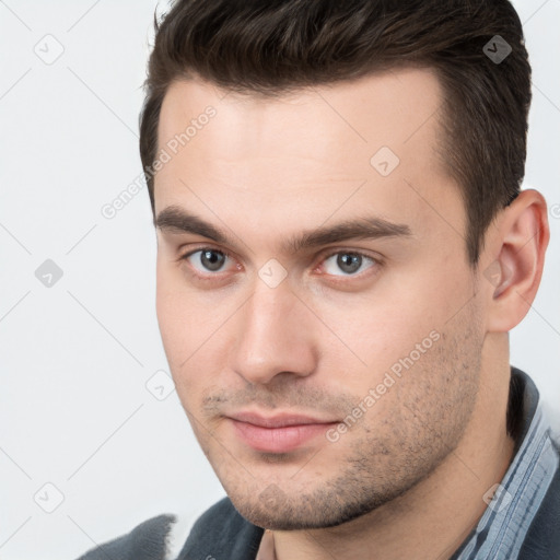 Neutral white young-adult male with short  brown hair and brown eyes