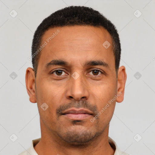 Neutral latino adult male with short  black hair and brown eyes