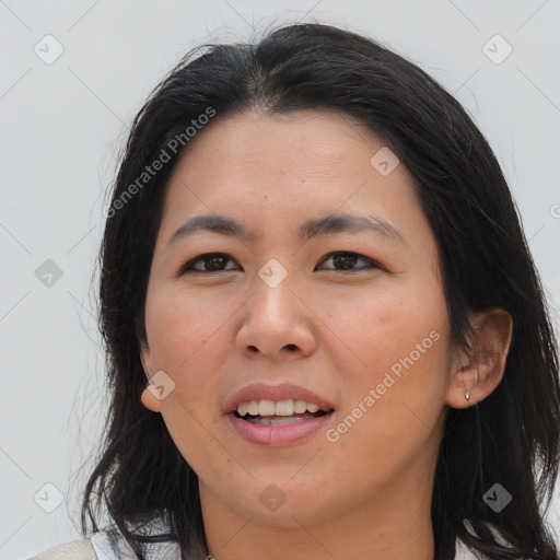 Joyful asian young-adult female with medium  brown hair and brown eyes