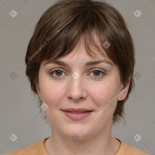 Joyful white young-adult female with medium  brown hair and grey eyes