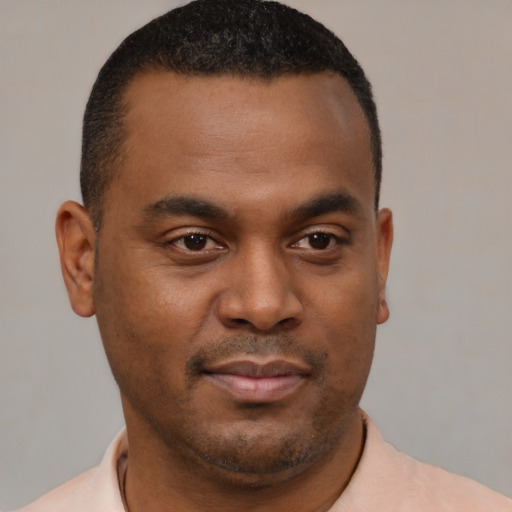 Neutral black young-adult male with short  brown hair and brown eyes