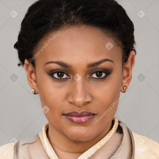 Joyful latino young-adult female with short  brown hair and brown eyes